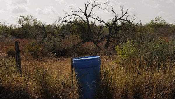 Barrels of drinking water for migrants walking through Texas have disappeared