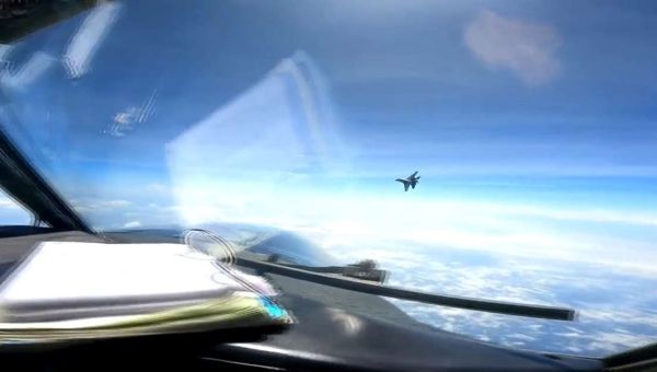 Chinese fighter jet BUZZES US military surveillance plane over South China Sea