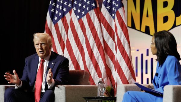 Trump falsely attacks Kamala Harris over race, saying she “happened to turn Black”