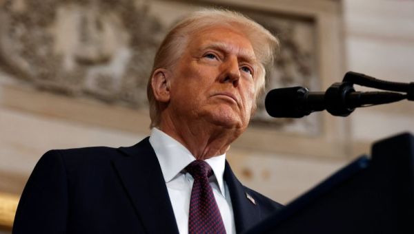 Trump touts political firings and retribution as he begins a government overhaul in his image