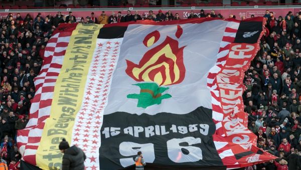 UK apologizes to families of 97 soccer fans killed in 1989 stadium crush