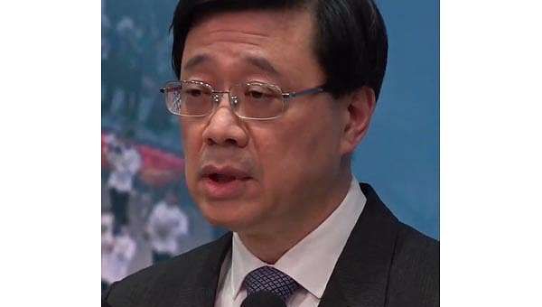 Wanted activists should surrender or ‘spend days in fear’: Hong Kong leader