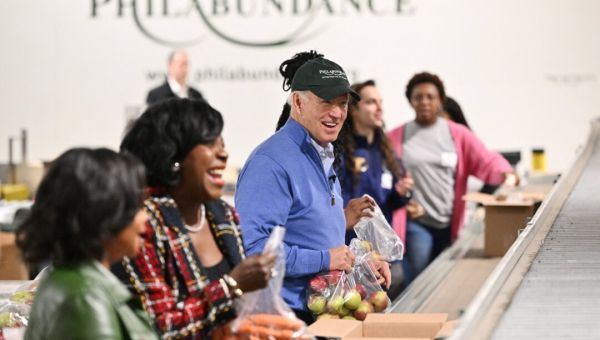 Biden Volunteers on MLK Day as Republican Candidates Brave Iowa Freeze