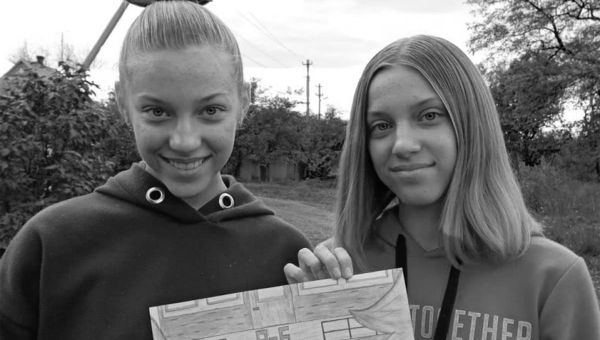 Twin sisters, aged 14, among at least 11 dead in Russian missile strike in Ukraine