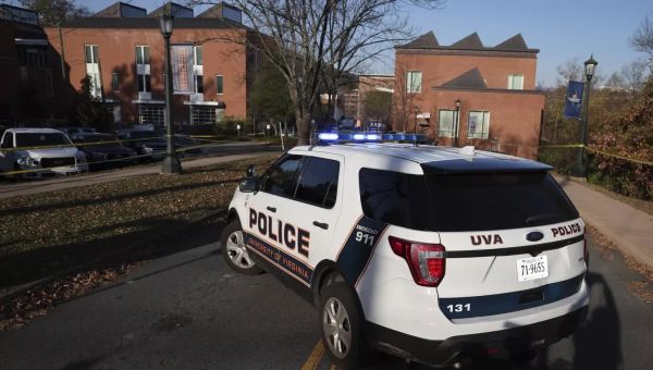 UVA shooting video shows students sheltering as manhunt continues