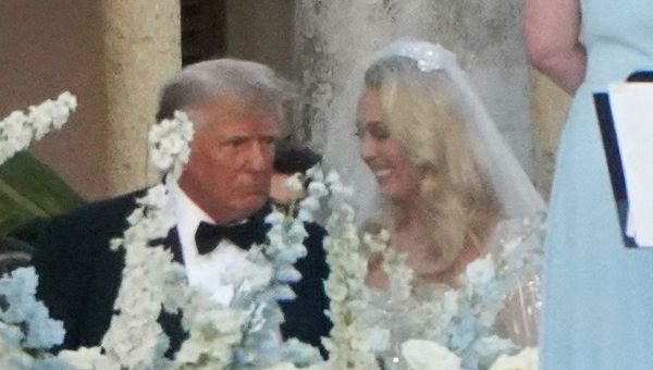 Tiffany Trump sparkles as Don walks her down the aisle at Florida wedding
