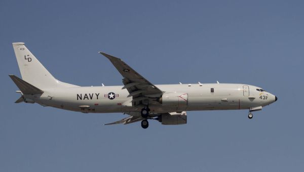 U.S. Navy aircraft shadowed by Chinese warplanes as it flies over Taiwan Strait