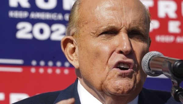 Rudy Giuliani accused of forcing consultant to perform sex act when on phone to Trump