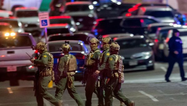 Second suspect in custody after one dead and three wounded in shooting – latest