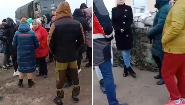 Russian military wives storm front line to demand husbands back