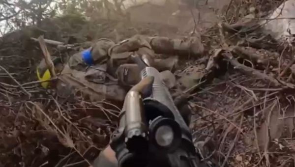 Moment Ukrainian warrior takes bullet to the head but keeps fighting
