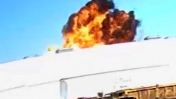 Horror moment plane crashes into California warehouse killing 2 & injuring 19