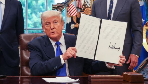 Trump signs exec order banning virus research feared to spawned Covid pandemic