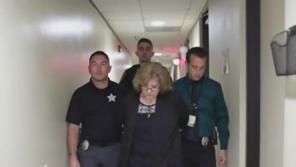 White woman who fatally shot Black neighbor through front door arrested on manslaughter and other charges