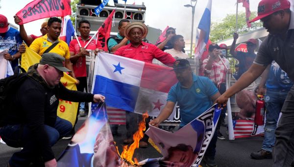 Protestors Burn US Flag Following Trump’s Threats to Retake Control of Panama Canal: ‘F*** Trump’