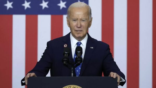 Biden sets goal of cutting greenhouse gases by more than 60%