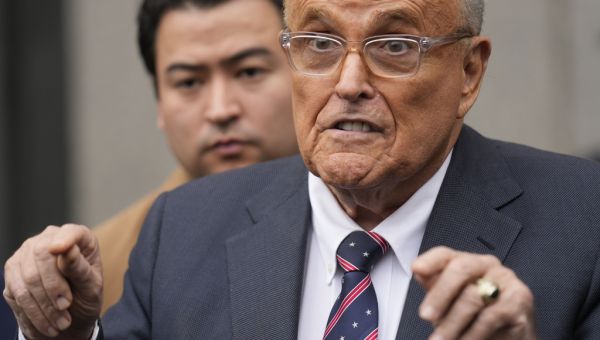 Rudy Giuliani draws rebuke for a courtroom outburst accusing judge in assets case of being unfair