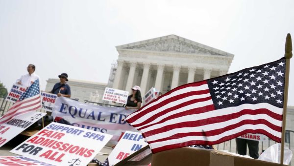 In the Supreme Court chamber, the subject was race, the mood was somber, the criticism harsh