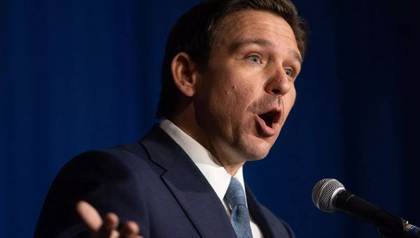 Video shows Ron DeSantis stormed on stage by screaming duo