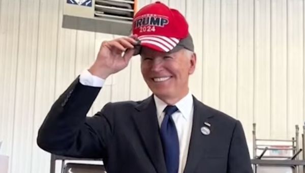 Joe Biden Jokingly Wears ‘Trump 2024’ Hat During 9/11 Unity Event, Reminds Folks to Not ‘Eat Dogs and Cats’ | Video