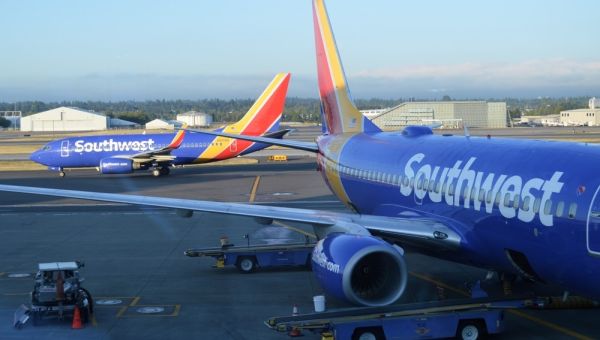 Man opens emergency escape hatch on Southwest Airlines flight, climbed out onto the wing