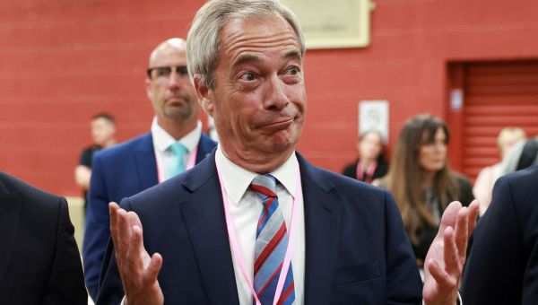 Farage toasts by-election success as party wins ‘by a gnat’s knob’