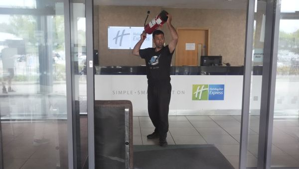 Rioters break into Holiday Inn hotel in Rotherham as injured police officer carried away by colleagues