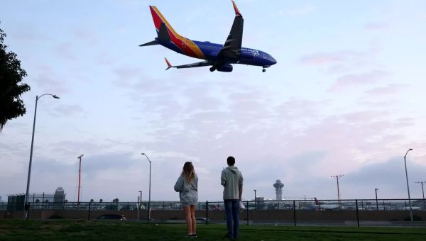 Southwest Airlines passenger jumps out of emergency door
