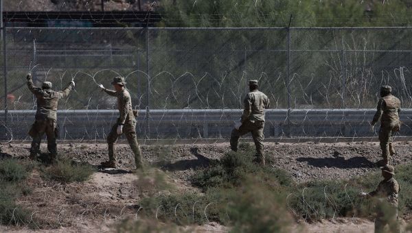 Judge temporarily bars federal government from cutting razor wire along the Texas border