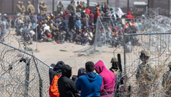 US court blocks Trump effort to revoke migrants’ legal status