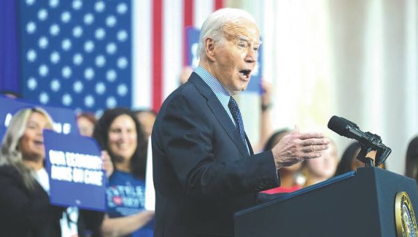 The Biden administration will require thousands more gun dealers to run background checks on buyers – West Hawaii Today