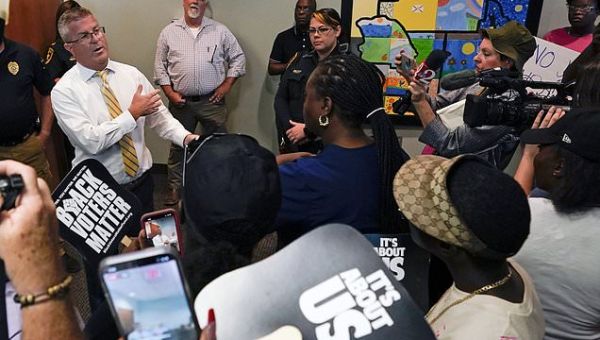 White woman who fatally shot Black neighbor is arrested in Florida