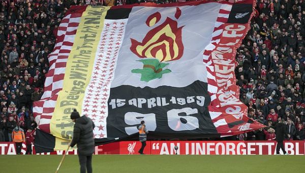 The UK apologizes to families of 97 Liverpool soccer fans killed...