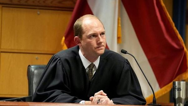 Georgia judge tosses several charges in Trump indictment