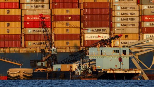 Engineers continue work to remove twisted steel from collapsed bridge