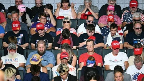 A ‘God moment’ in Michigan as Trump preaches to faithful