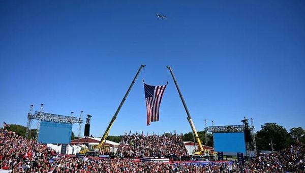 'Fight': defiant Trump jets in to site of rally shooting