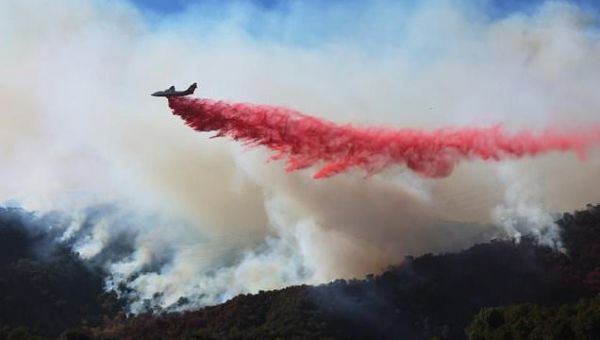 Firefighters race to beat LA blazes as winds grow and death toll…