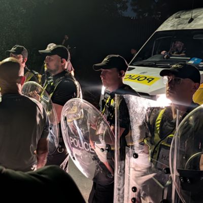 Chaos as riot police face off with anti-migrant crowds