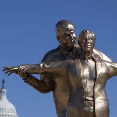 Trump and Epstein embrace in giant gold statue copying iconic Titanic scene