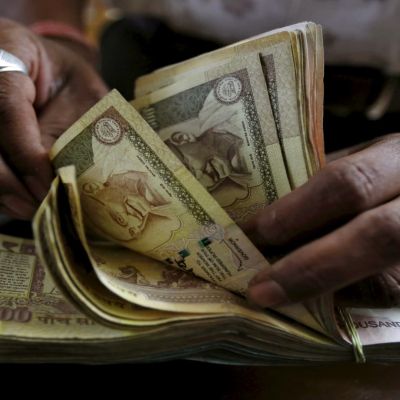India scraps tax on overseas bond investors in bid to attract foreign capital and shore up the rupee