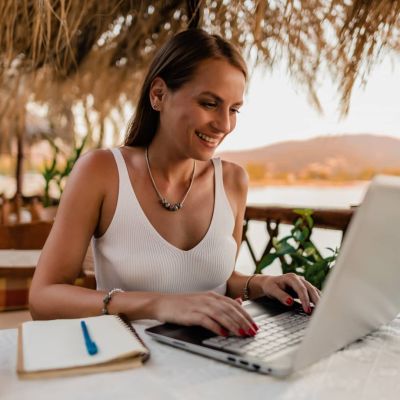 7 remote and hybrid companies that will pay for your vacation — they’re all hiring