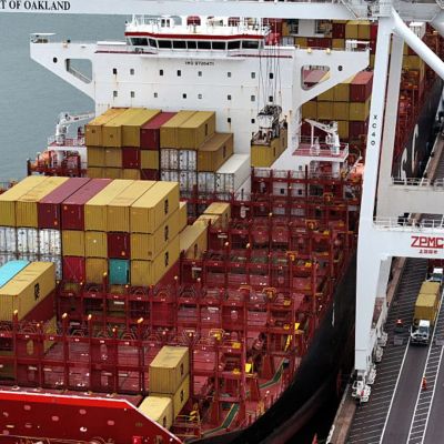 Businesses are already trying to pass tariff costs onto customers, Fed report says