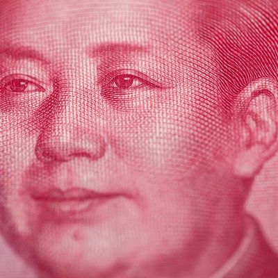 China’s Overseas Investment Adds to Cash Exodus Weighing on Yuan