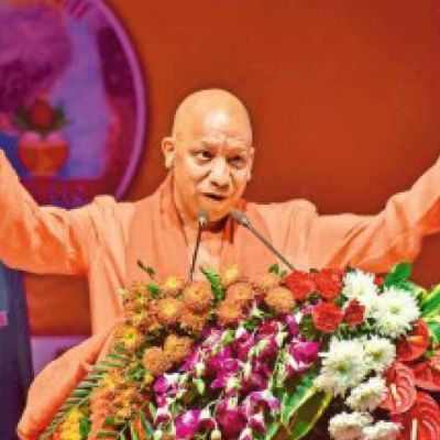 Yogi greet citizens on Constitution Day