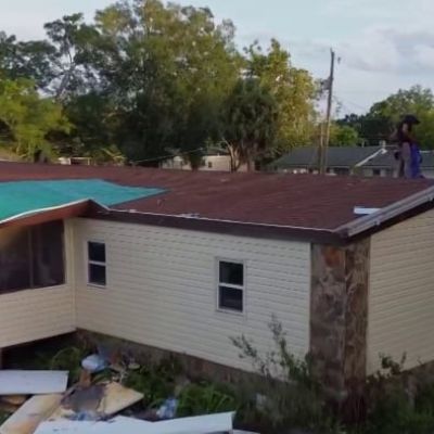 Outer bands of Helene damage Orange County home, ripping off roof