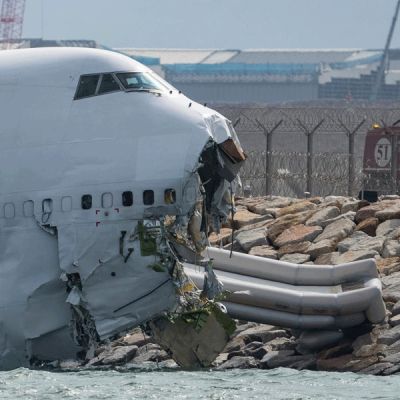 Cargo plane skids off Hong Kong International Airport runway into sea, two dead