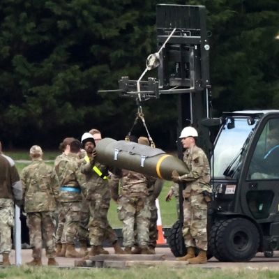 Iran link examined as UK police quiz five men held at air base used by US