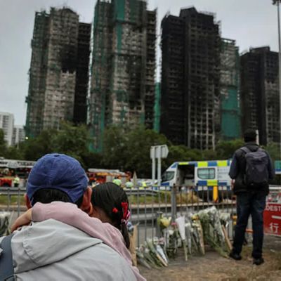 Hong Kong proceeds with election amid grief over deadly fire