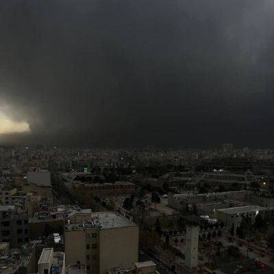 Thick black clouds blanket the Iranian capital of Tehran after Epstein Coalition airstrikes targeted oil storage sites and a refinery in Tehran